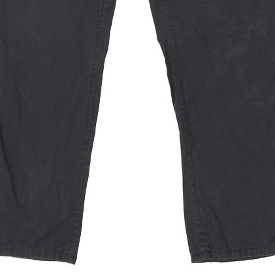 Vintage black Tommy Hilfiger Trousers - mens 33" waist