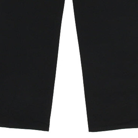 Vintage black Versace Jeans - womens 32" waist