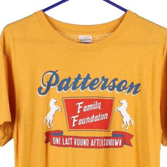 Vintage yellow Patterson Charlie Hustle T-Shirt - mens medium