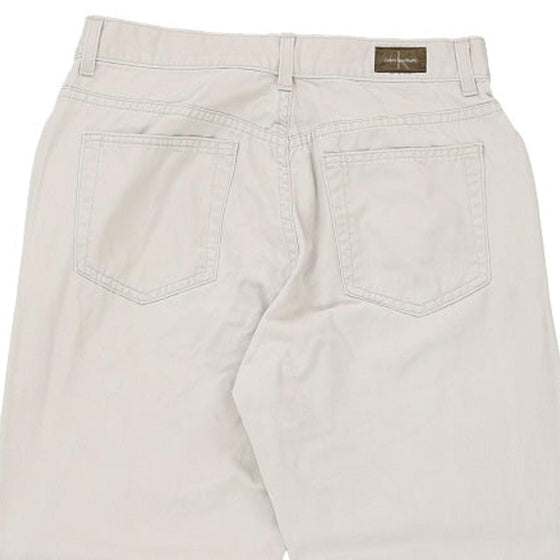 Vintage white Calvin Klein Trousers - womens 26" waist
